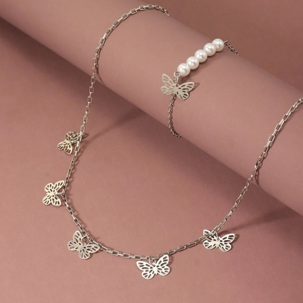 Silver Colored Butterfly and Faux Pearl Necklace and Bracelet Set